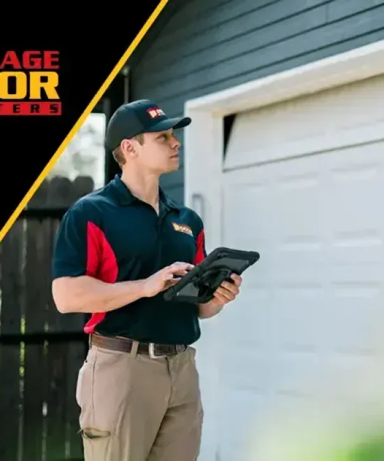 Garage Door Masters banner: a technician in uniform polo and cap checks a tablet by a white sectional door